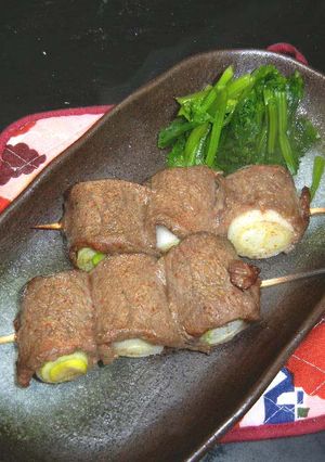 A picture of Beef-Wrapped Green Onion Skewers.