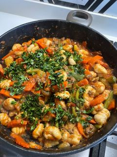 Una foto de ÑOQUIS DE PAPA y AVENA Salsa Boloñesa/Verduras Salteadas