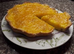Una foto de Tarta de mango y crema de queso