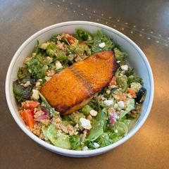A picture of Honey sriracha glazed salmon with quinoa salad.