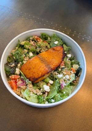 A picture of Honey sriracha glazed salmon with quinoa salad.