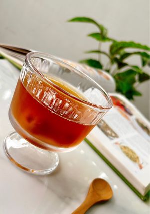 Hình của món Nước trái vải ngâm đường nâu.