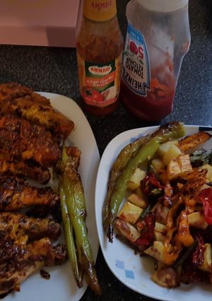 A picture of Grilled Chicken drum sticks with vegetable #eid k pakwan.
