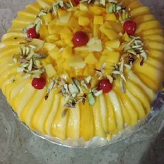 A picture of Mango tres leches Cake.