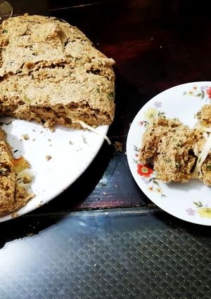 Una foto de Pan de ajo y perejil con queso