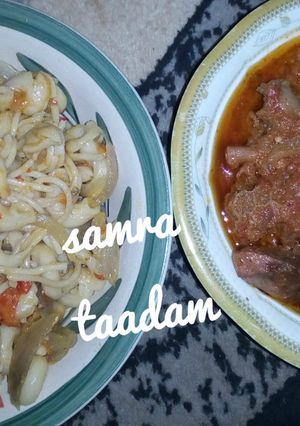 A picture of Jollof macaroni with stew.