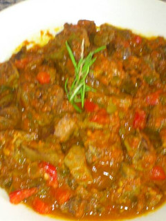 Una foto de Pisto con Asadurilla de chivo o cordero, y toque de romero