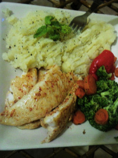 A picture of Steamed Basa with Mashed potatoes,Brocolli and baby carrots.