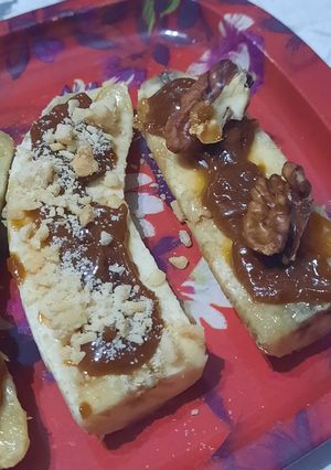 Una foto de Banana tibia con dulce de leche
