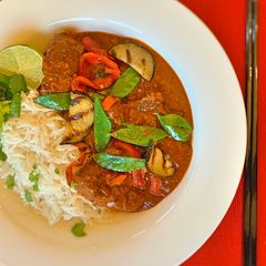 A picture of Slow cooked - Red Thai Beef Curry with Veggies.