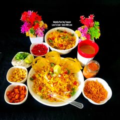 A picture of Indori Special Steamed Poha & Jalebi With Masala Tea - Indian Breakfast.