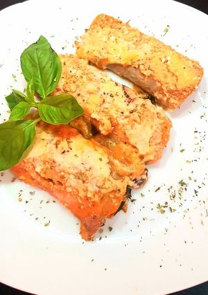 Una foto de Canelones de crepes integrales con champis, tomate y mozzarella
