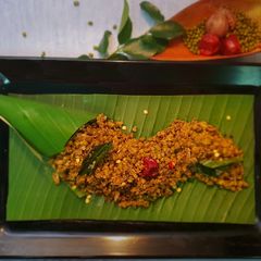 A picture of Vaazhakoombu cherupayar thoran (banana blossom with lentil).