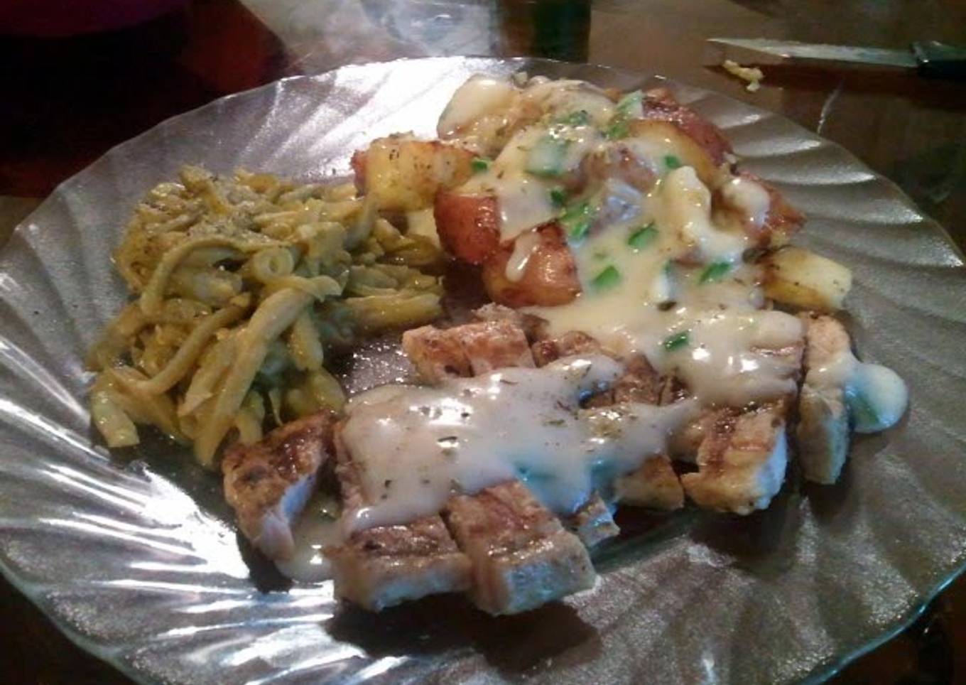 Sean's-Leek white gravy smothered pork chops w/ Roasted Red Potatoes