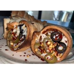 A picture of Pizza cones.