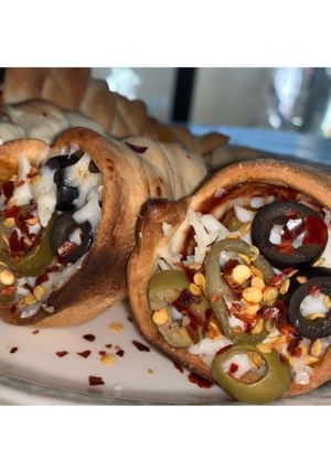 A picture of Pizza cones.