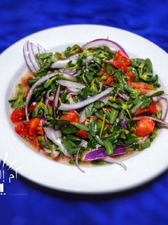 صورة لوصفة سلطة البقلة🌱🌿🍅 (المرجيلة البندراق،بالبرزقالة،بلكازيط)