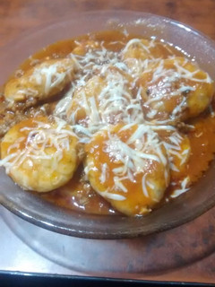Una foto de Ñoquis rellenos de la nona