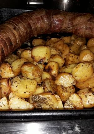 Una foto de Matambre al horno con papas en su jugo
