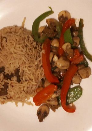 A picture of Pilau served in mushrooms veges.