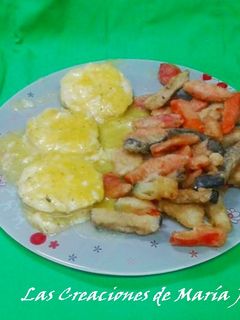 Una foto de Medallones de merluza en salsa de naranja