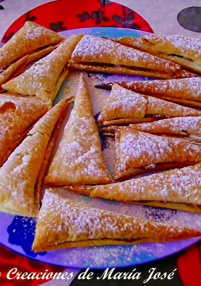 Una foto de Triángulos de dulce de leche