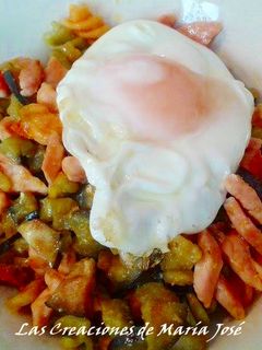 Una foto de Salteado de berenjena y lomo