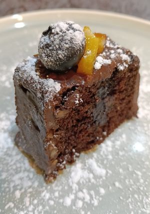 Foto principal de Plumcake vegano de chocolate relleno de coulis de arándanos y cobertura de ganache chocolate