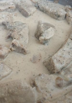 Una foto de Lomo de cerdo con champiñones a mi manera