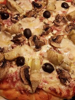 Una foto de Pizza Caprichosa