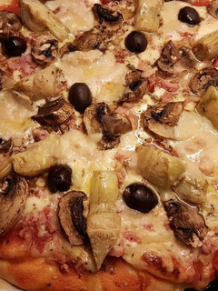Una foto de Pizza Caprichosa