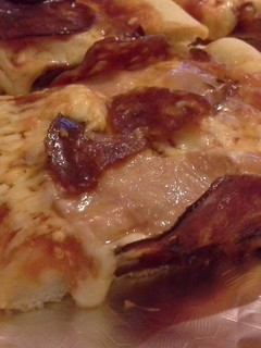 Una foto de Pizza de ibéricos