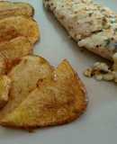 Merluza con queso gratinado y patatas fritas con pimientón rojo