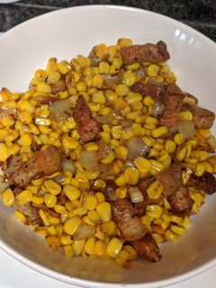A picture of Country Style Corn and Pork Belly/Bacon.