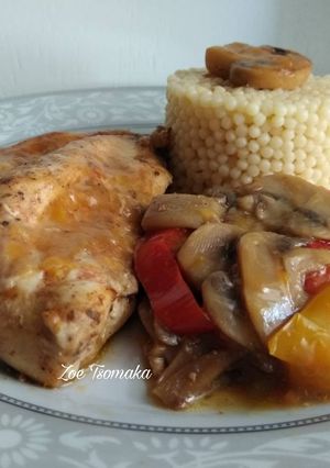 A picture of Lemon Chicken with Colorful Peppers and Mushrooms.