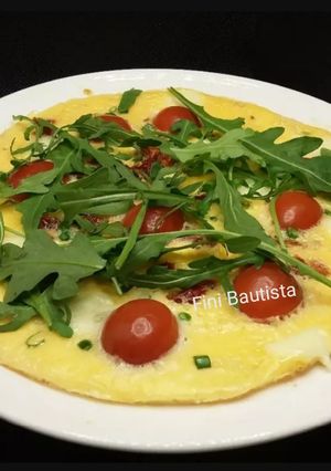 Foto principal de Torti pizza de cherrys y rúcula