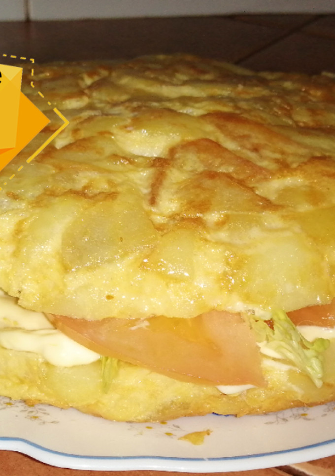 Una foto de Tortilla de patatas rellena