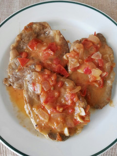 Una foto de Filetes de cabeza de lomo en salsa