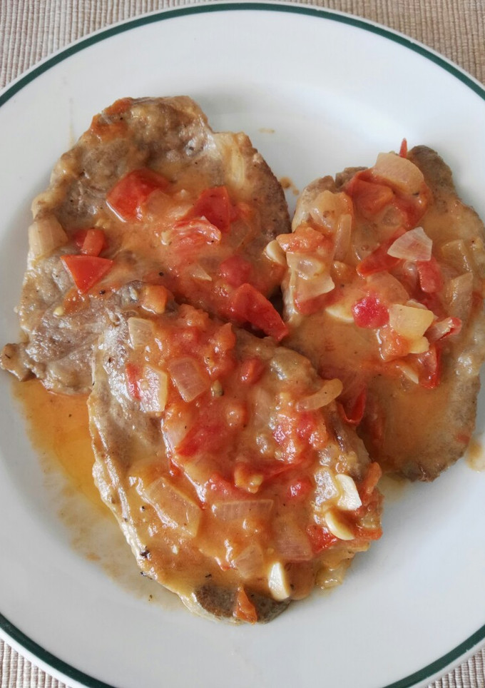 Una foto de Filetes de cabeza de lomo en salsa