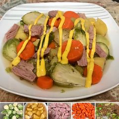 A picture of Corn beef and brussels sprouts.