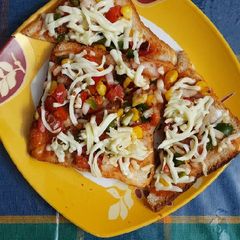 A picture of Bread pizza cheese.