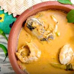 A picture of Traditional Kerala Thenga Aracha Meen Curry.