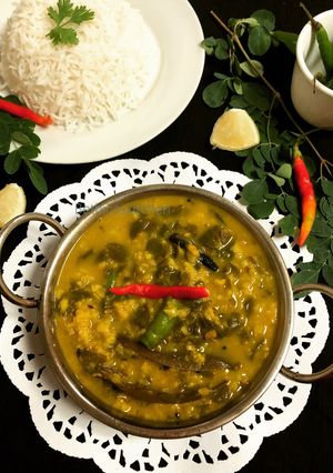 A picture of Sojne Pata diye Bhaja Muger Dal (Drumstick Dal - Bengali Style).