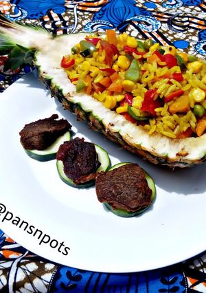 A picture of Fried Rice with Fried beef.