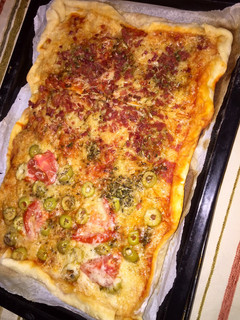 Una foto de Mitad pizza vegetariana 🧡 🧡