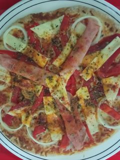 Una foto de Pizza al gusto