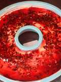 Rosca de tarta de queso con almendras