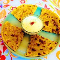 A picture of Winter Squash (yellow pumpkin) & Lauki Paratha.
