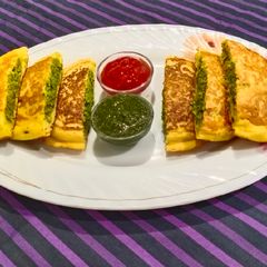 A picture of Mix dal peas stuffed uttapam.