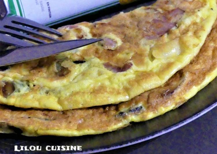 Recette Délicieux Omelette oignons, champignons, allumettes de bacon